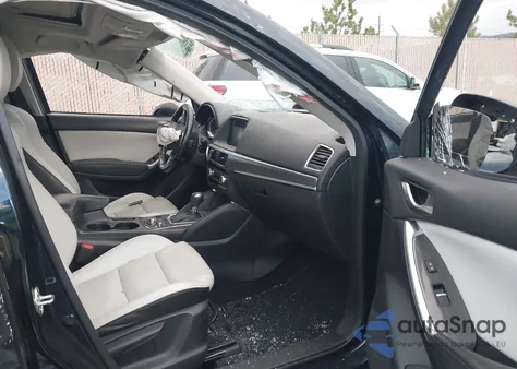 2016 Mazda Cx-5 Grand Touring z USA, uszkodzony, nr VIN JM3KE2DY2G0839090